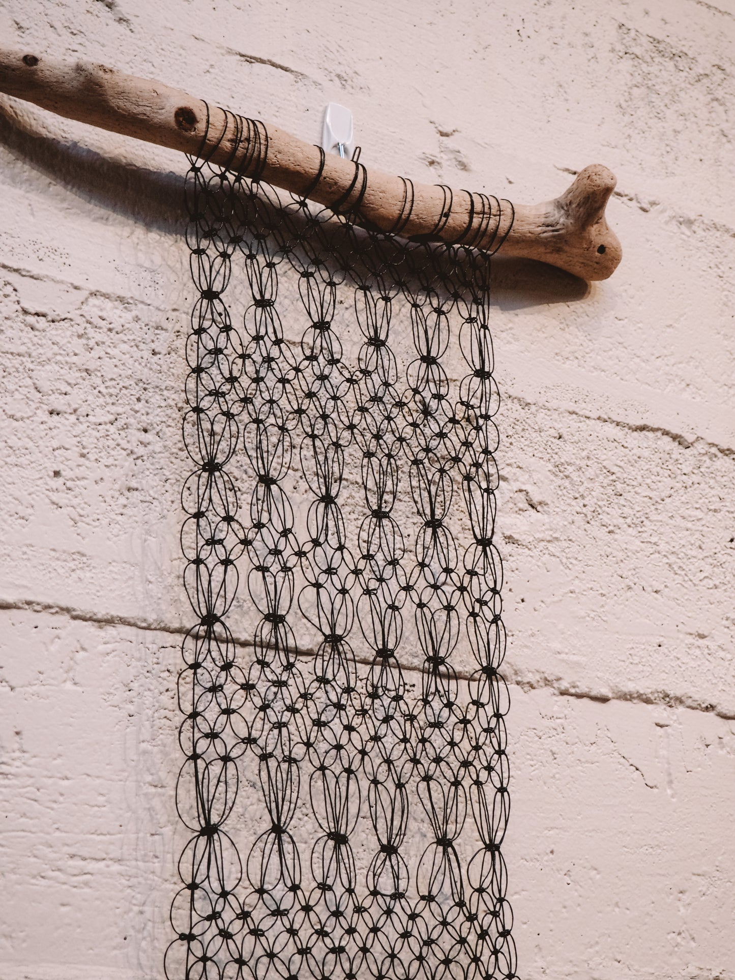 Black Beaded on Driftwood
